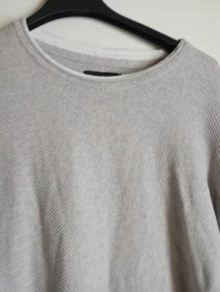 Blusa gris de manga larga