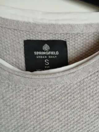 Blusa gris de manga larga