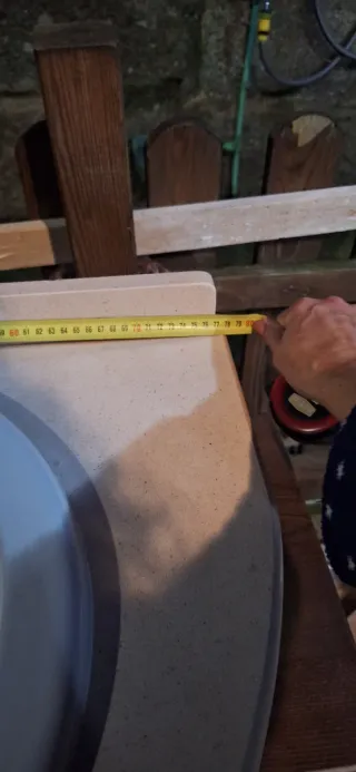 Lavabo de cerámica y piedra con mueble