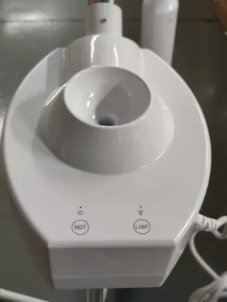 Vaporizador facial con lupa