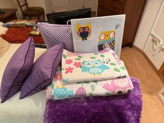 Set di biancheria per la casa: federe, lenzuola e tappeti