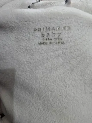 Mono nieve floral con capucha