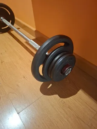 Barra de pesas con discos