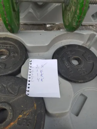 Pesas con maletín y discos