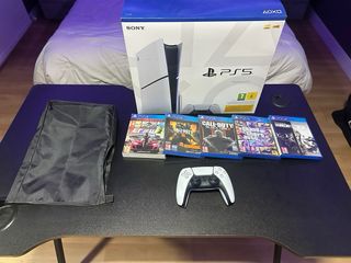 PS5 1TB + MANDO + 5 JUEGOS ¡REGALO FUNDA Y BASE!