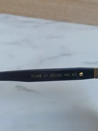 Occhiali da sole neri e oro