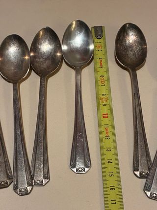 11 cucchiaini da dessert in metallo argentato