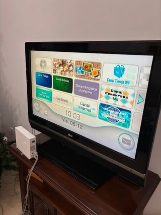 Nintendo Wii + Mario Kart + Mando y accesorios