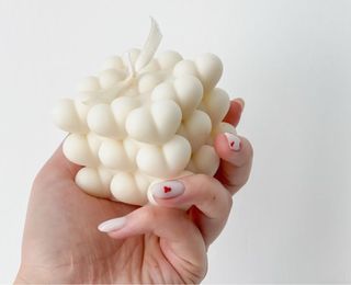 Candela in cera d'api a forma di cuore