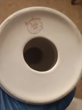 Busto porcelana niño con sombrero