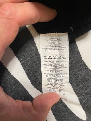 Jersey cuello alto rayas gris y negro. Talla M.