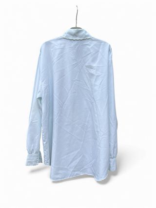 Camicette bianche con colletto ricamato