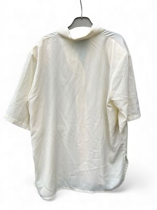 Camicette bianche con colletto ricamato