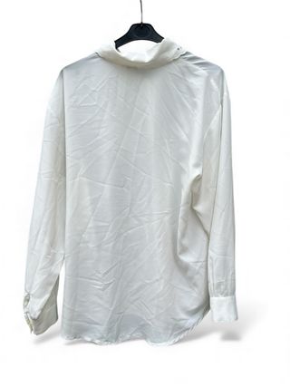 Camicette bianche con colletto ricamato