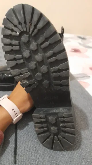 Botas negras efecto piel