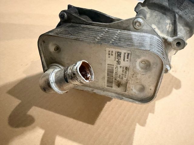 Portafiltro y radiador aceite