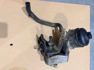 Portafiltro y radiador aceite