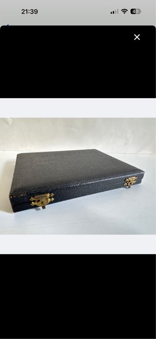 Tenedores de metal plateado con estuche