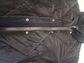 Plumón niña Primark negro 10-11 años