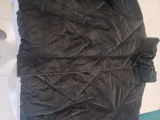 Plumón niña Primark negro 10-11 años