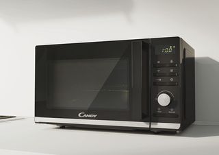 Candy CMGA20TNDB Mikrowelle / 700 Watt/Grill 1000