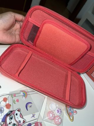 Nintendo Switch Lite Coral y juego animal crossing