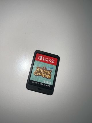 Nintendo Switch Lite Coral y juego animal crossing