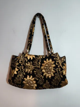 Bolso de fiesta negro y dorado brocado · Elegante