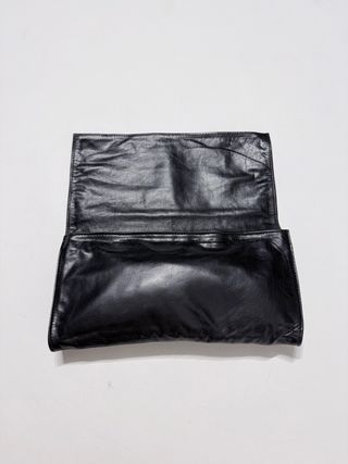 Pochette Gucci in pelle nera