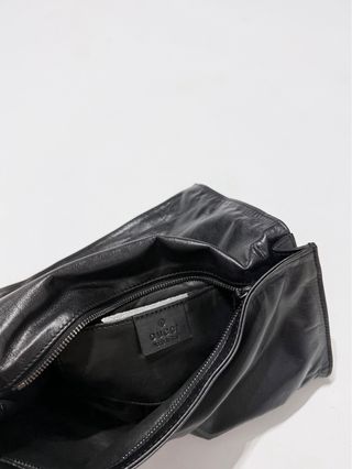 Pochette Gucci in pelle nera