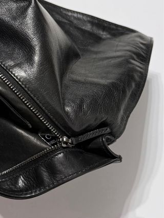 Pochette Gucci in pelle nera