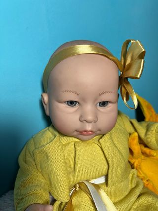 Bambola piangente  basta toccargli il pancino