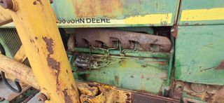 John Deere 3120 con pala.