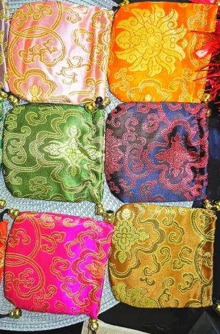 Monedero redondo ajustable