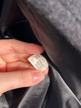 Abrigo capa lana cuello alto manga onda 65% lana