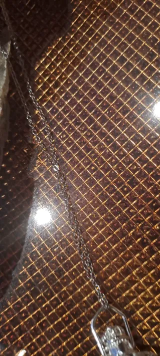 Llamador de ángeles con colgante verde