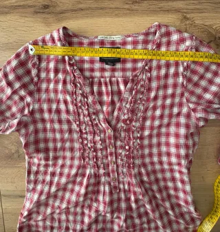 Camicetta a quadri rossa e bianca