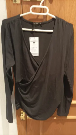 Camisea negra manga larga talla L