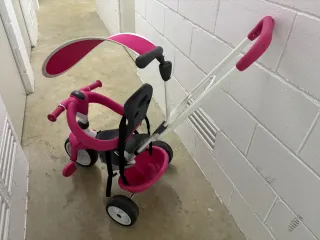 Triciclo infantil rosa y blanco