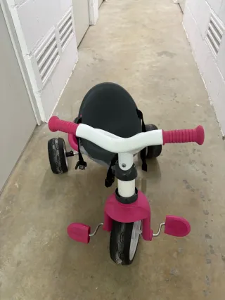 Triciclo infantil rosa y blanco