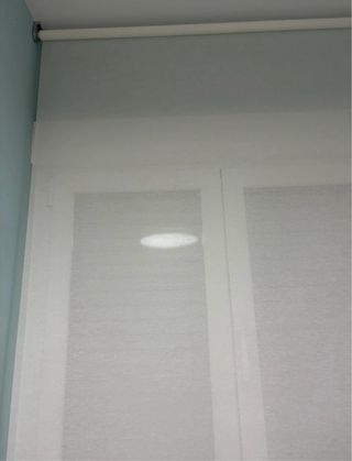 Estore enrollable blanco tela