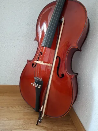 Violonchelo con arco + funda + atril + correa pica