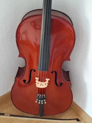 Violonchelo con arco + funda + atril + correa pica