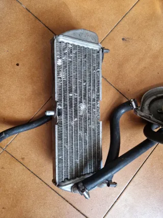 Radiador Jog RR con depósito