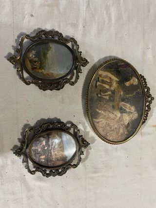 Cornici antiche ovali con dipinti