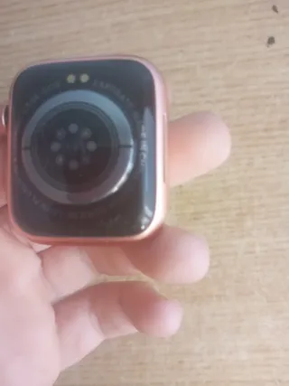 Reloj rosa sin cargador con pulsera