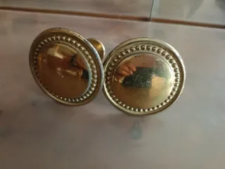 Agganci per tende dorati