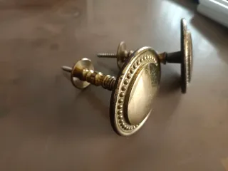 Agganci per tende dorati