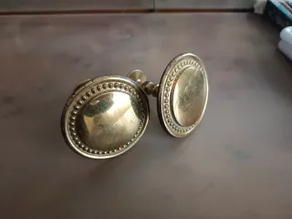 Agganci per tende dorati