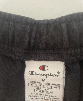 Tuta bimbo Champion blu e nera